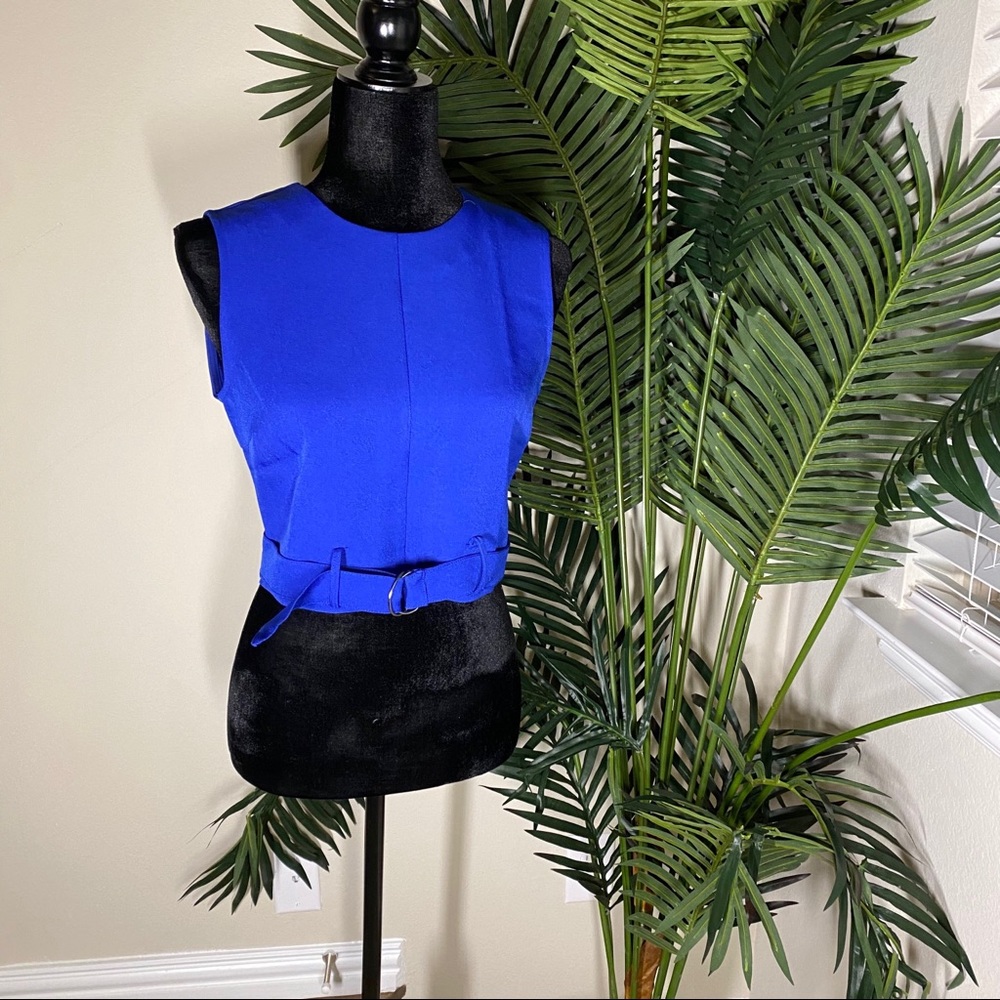 Blue racerback style crop top with belt detail ✨